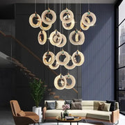 Golden crystal-encrusted decorbites led staircase chandelier with green gemstones for modern living room pendant light
