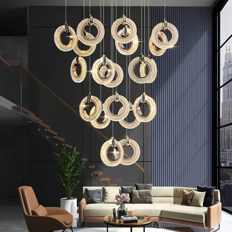 Golden crystal-encrusted decorbites led staircase chandelier with green gemstones for modern living room pendant light