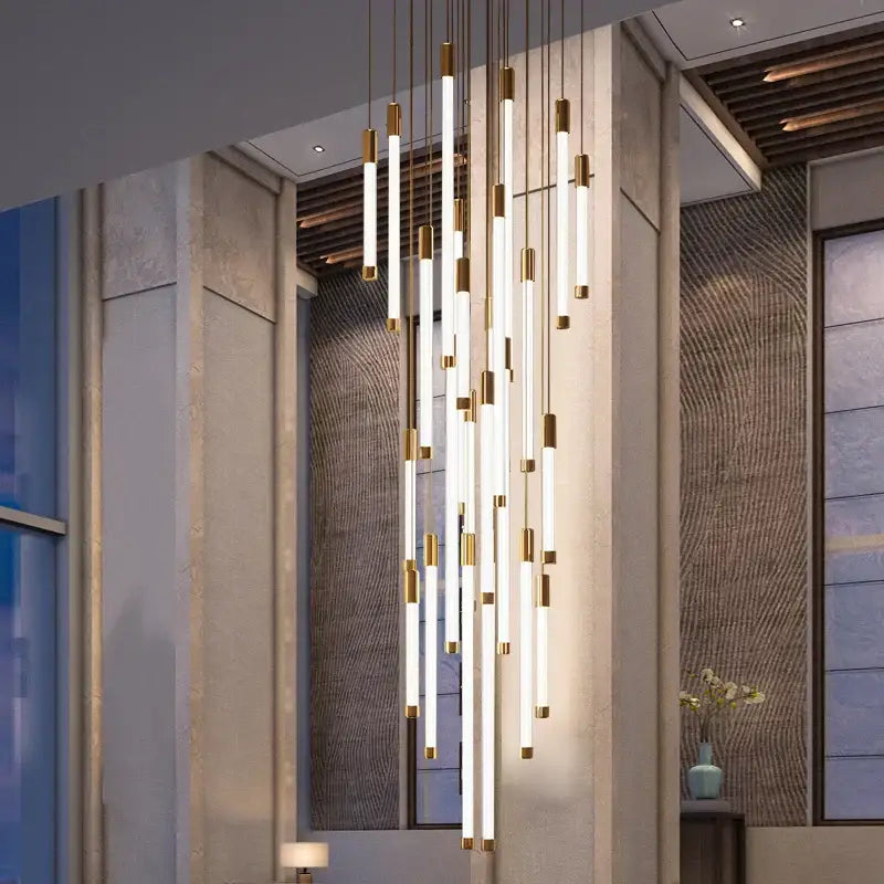 Modern gold-accented led staircase chandelier with vertical illuminated tubes for living room or restaurant lighting