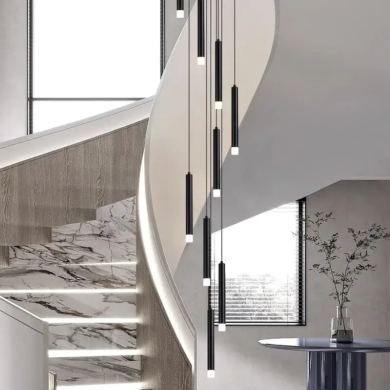 Modern black cylindrical decorbites led staircase pendant lights with white illuminated ends for living room decor