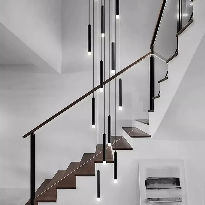 Modern black cylindrical decorbites led staircase chandeliers hang in cascading arrangement for living room decor