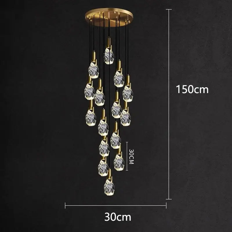 A modern gold-toned pendant light with faceted crystal droplets from DecorBites LED staircase chandeliers