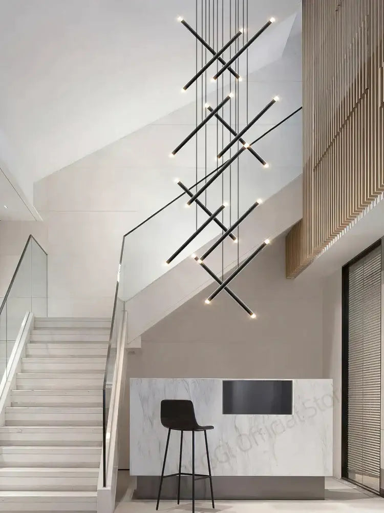 Black geometric decorbites led staircase pendant chandelier with intersecting rods and embedded lights for modern spaces