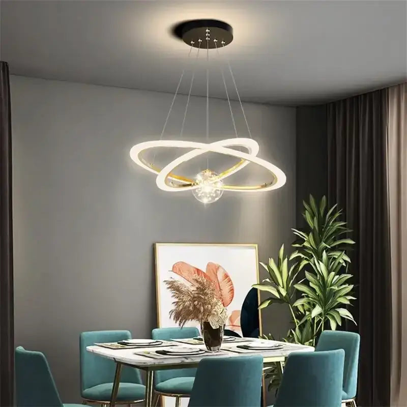 Modern led chandelier with two interlocking white rings and central crystal accent by decorbites led star chandelier