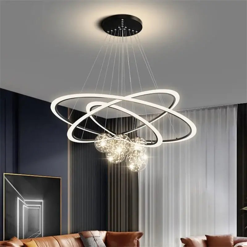 Modern white DecorBites LED Star chandelier with interlocking rings and crystal globe pendants for living room decor
