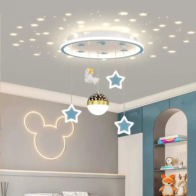 A modern DecorBites led star chandelier with blue star moon decals and astronaut for kids bedroom and study room lighting