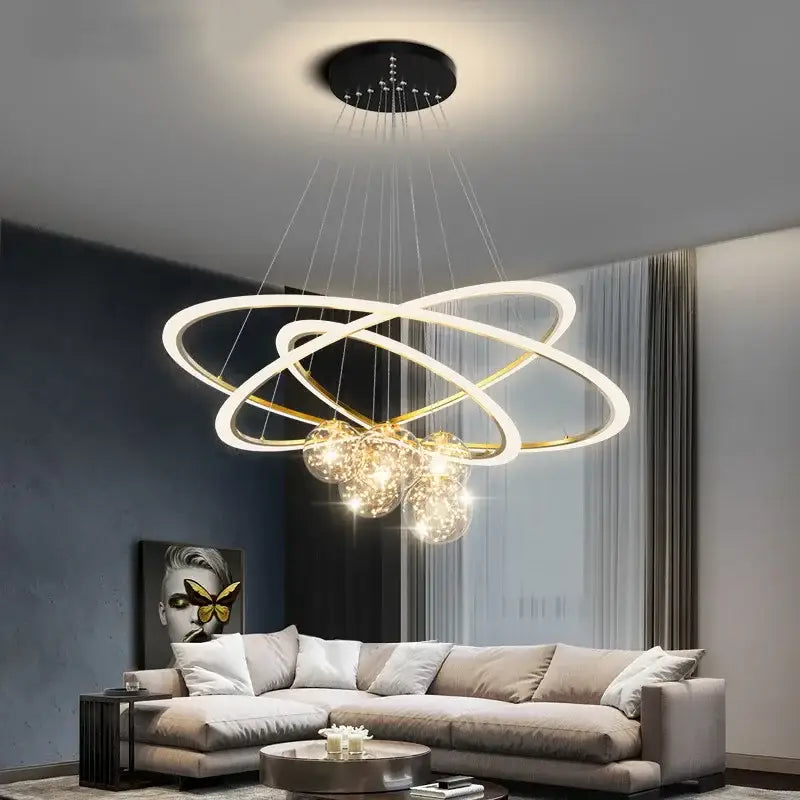 Modern minimalist decorbites led star chandeliers with white and gold rings and warm crystal globe lights for living room decor