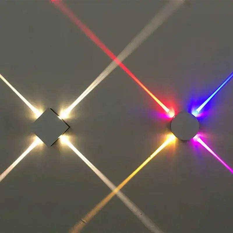 Two modern decorbites led star wall lights one square one circular emit vibrant colored beams for corridor decoration