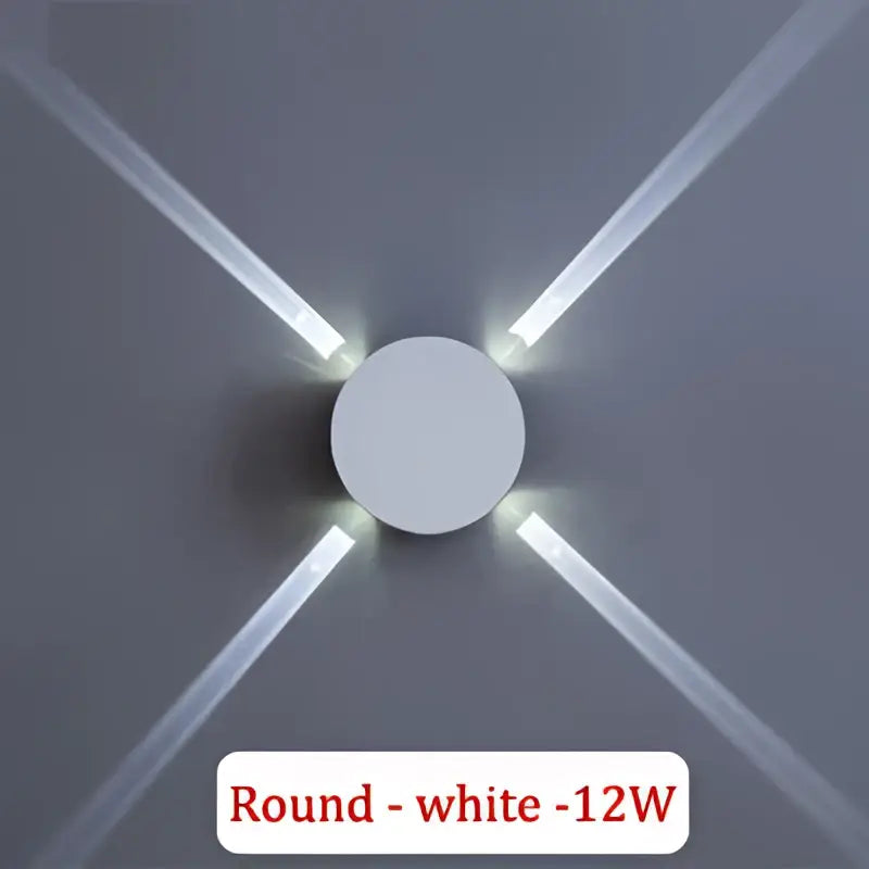 White round DecorBites LED Star wall light with four angled LED beams for bright corridor and bar decoration