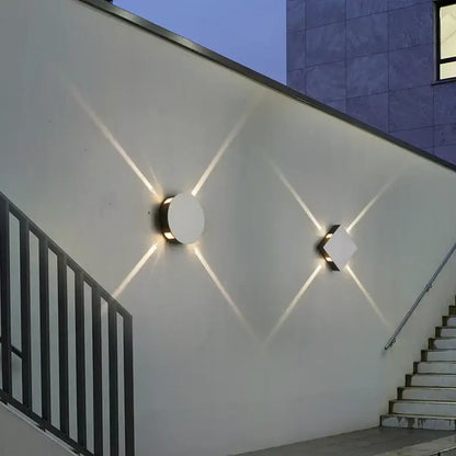 Modern minimalist decorbites led starlight wall lamp with white circular and diamond fixtures emitting warm light patterns