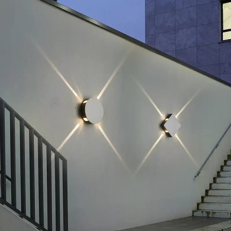 Modern minimalist decorbites led starlight wall lamp with white circular and diamond fixtures emitting warm light patterns