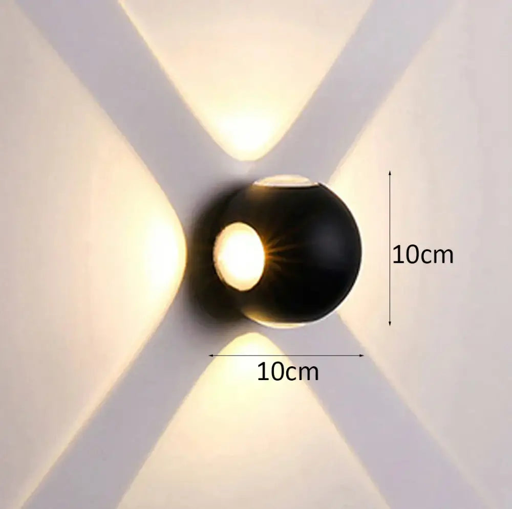 Black spherical decorbites led starlight wall lamp with modern design emitting warm light for indoor and outdoor use