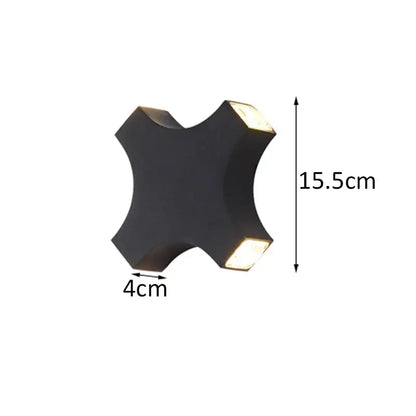 Black modern cross-shaped DecorBites LED Starlight wall lamp with four illuminated panels for indoor and outdoor use