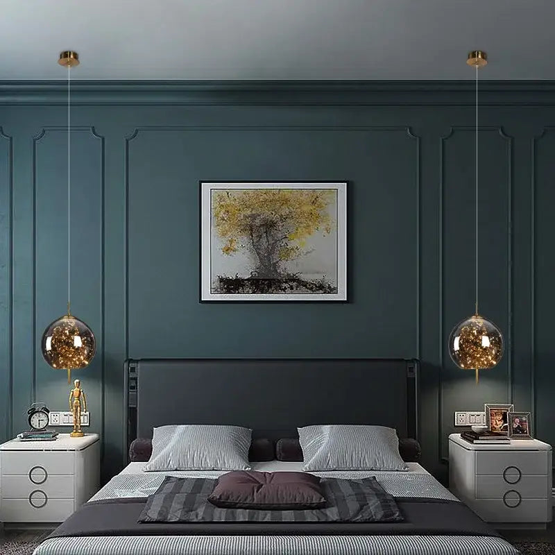 A pair of decorbites led starry sky pendant lights with golden fixtures and warm led bulbs for luxury living rooms