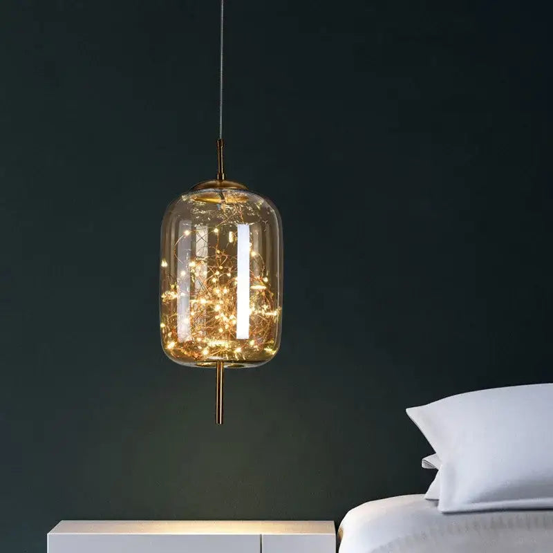 A warm-toned glass pendant light with brass finish featuring intricate fairy lights for decorbites led starry sky luxury lamps