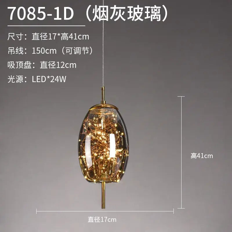 A modern decorbites led starry pendant light with a smoky glass globe and golden led string lights suspended by brass chain