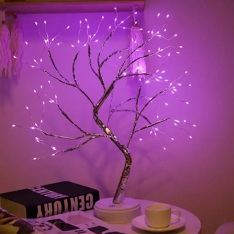 A silver branch-like table lamp with embedded led lights from decorbites led starry tree collection for ambient lighting