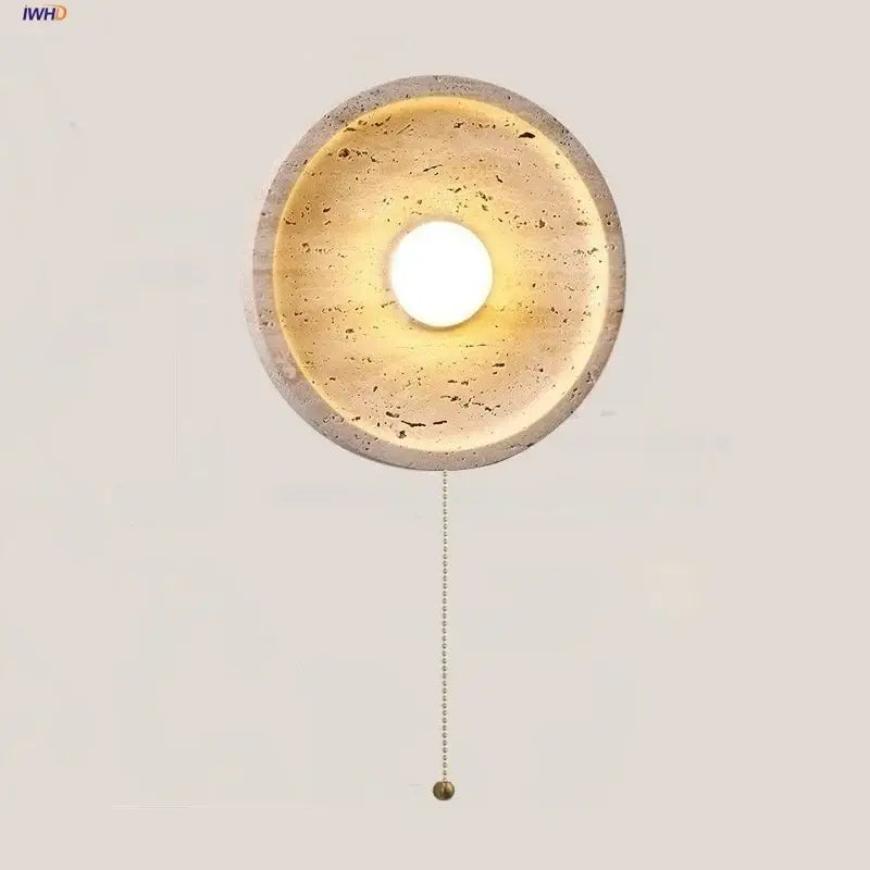 Circular concrete decorbites led stone wall lamp with warm textured interior and brass pull chain for modern home decor