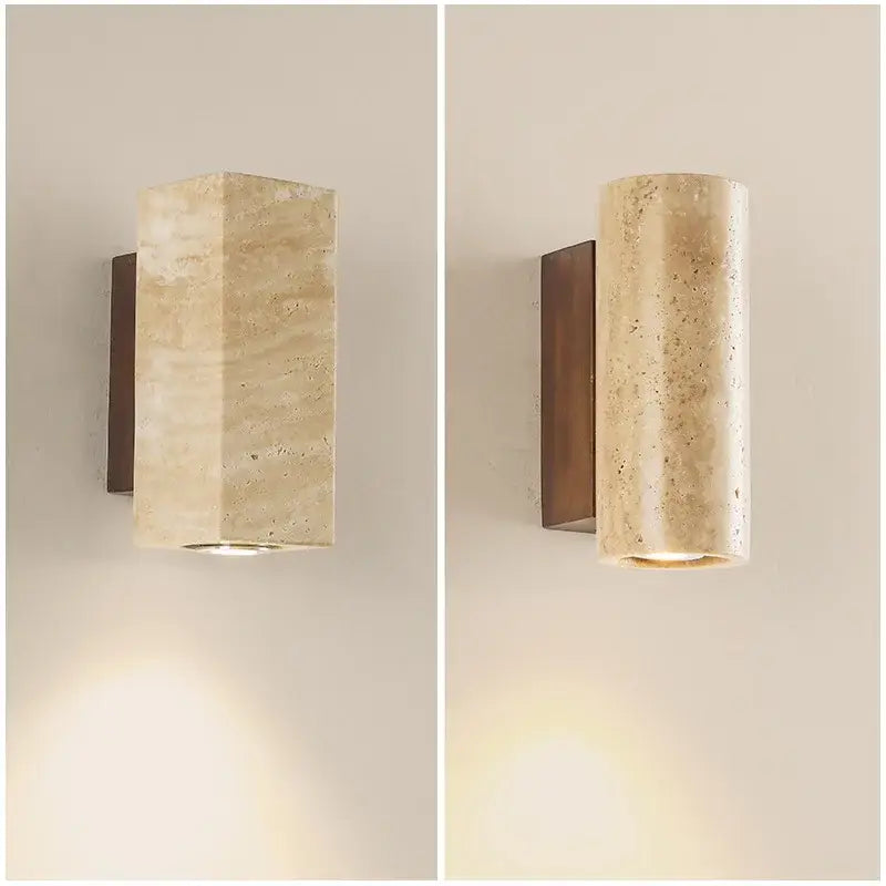 Beige decorbites led stone wall sconce with rectangular cylindrical design natural veining on dark bronze bracket