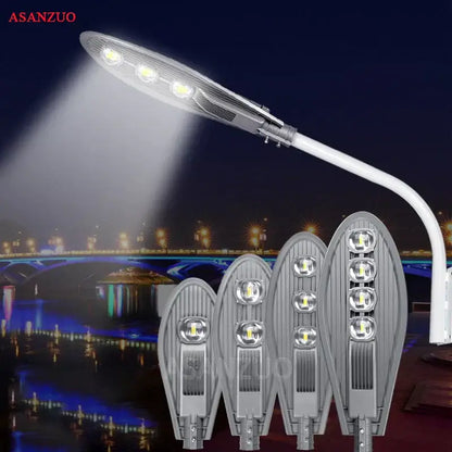 Silver-colored DecorBites LED street light with sleek design, multiple bright bulbs, and curved arm for outdoor garden lighting