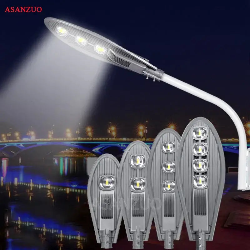 Silver-colored DecorBites LED street light with sleek design, multiple bright bulbs, and curved arm for outdoor garden lighting