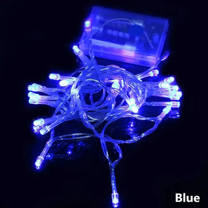 DecorBites led string featuring blue led string lights with clear plastic wiring and a translucent battery box for parties