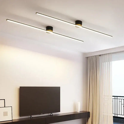 Modern decorbites led strip ceiling light with sleek black cylindrical fixtures and warm white led strip ceiling illumination