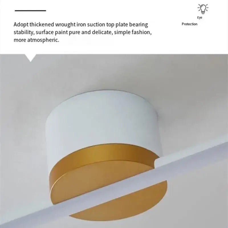 Decorbites led strip ceiling light with white and gold cylindrical design and thick wrought iron top plate for indoor use