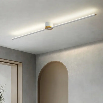 Decorbites led strip ceiling light with sleek white cylindrical body and gold accents for modern ambient home lighting