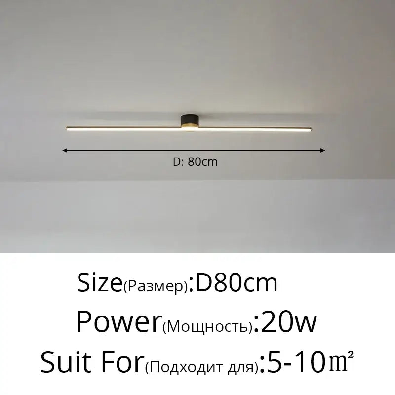 Modern minimalist linear led strip ceiling light by DecorBites with sleek black fixture and warm white illumination