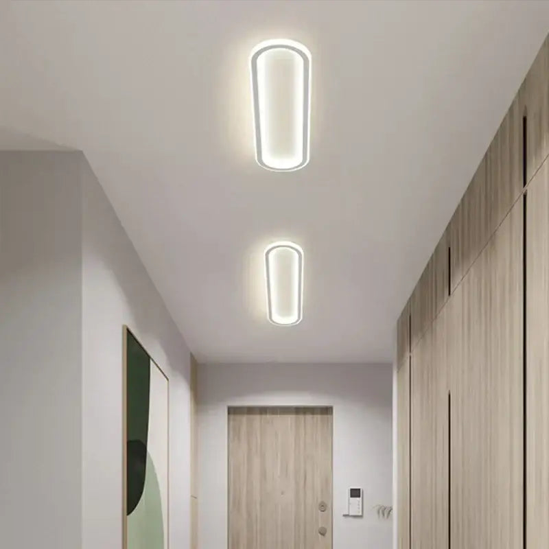 Modern rectangular led strip ceiling light with sleek white frame and soft glow by decorbites for bedroom hallway decor