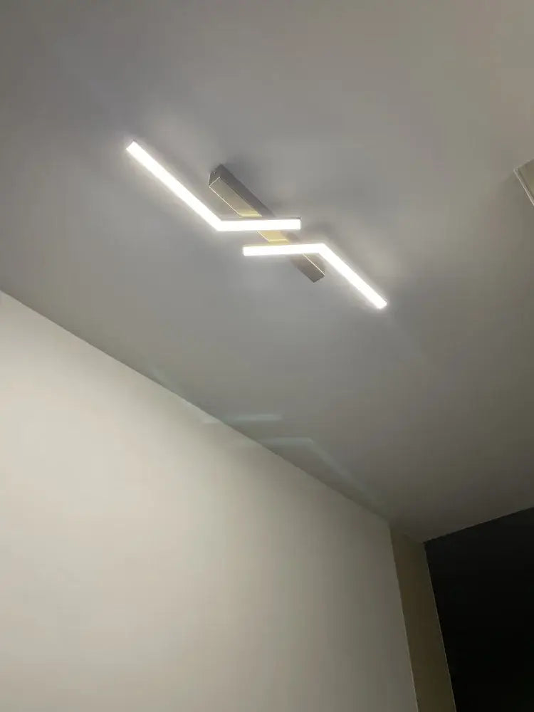 Modern chrome-finished decorbites led strip ceiling light with two intersecting led strips for corridor and balcony lighting