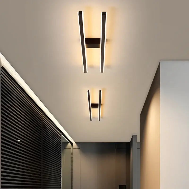 Modern black and white linear decorbites led strip chandelier emitting warm glow for aisle corridor balcony lighting