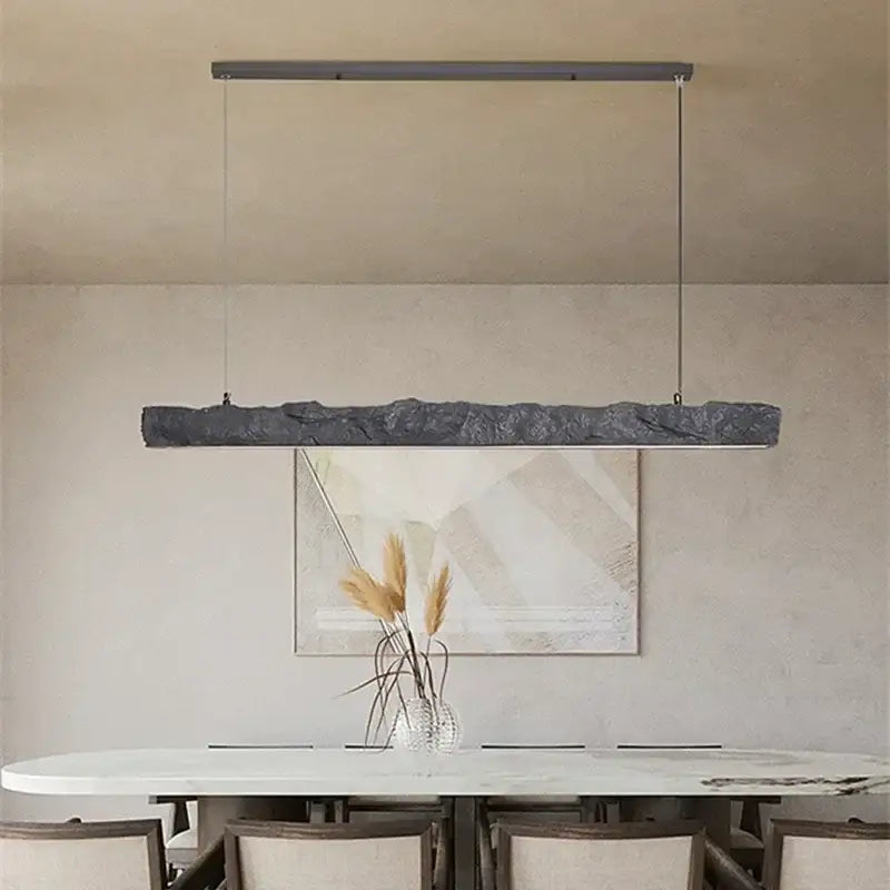 Modern gray stone-textured pendant lights with sleek metallic hardware from decorbites led strip chandelier collection