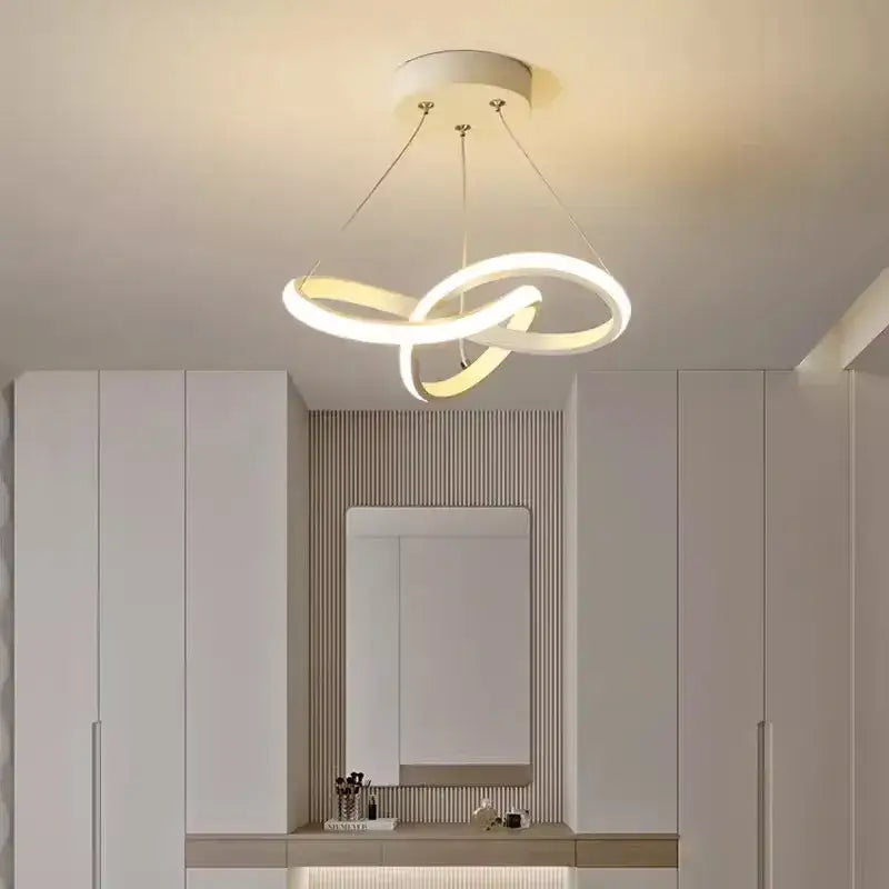 Modern black and gold pendant light with intertwined white led strip modern rings for dining room decorbites led strip lighting