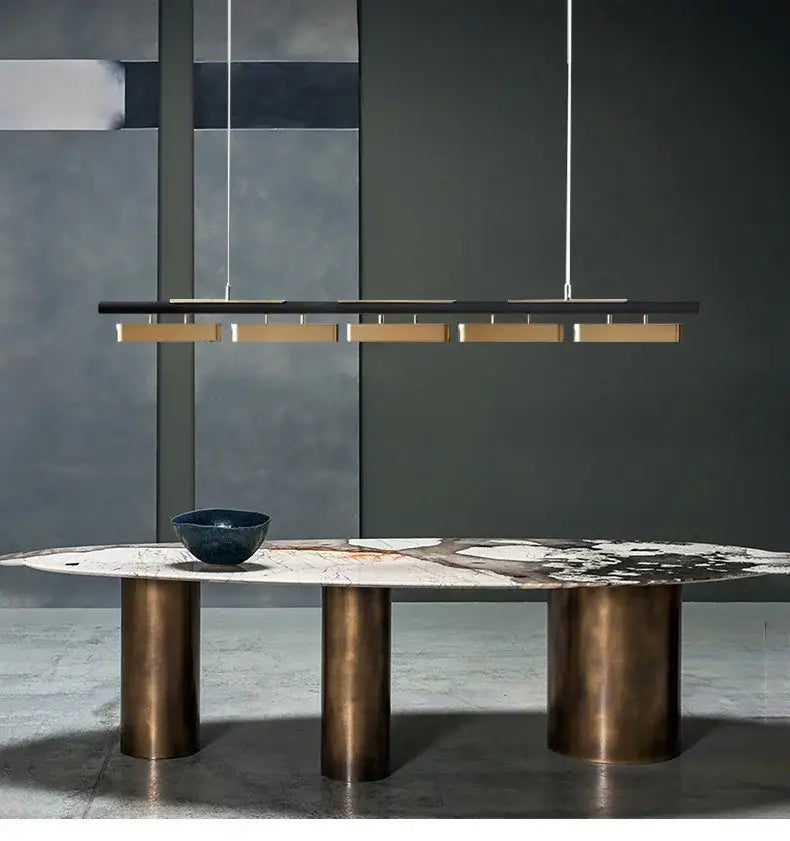 DecorBites™ minimalist strip led pendant lights with a sleek black bar and brass accents for modern home dining