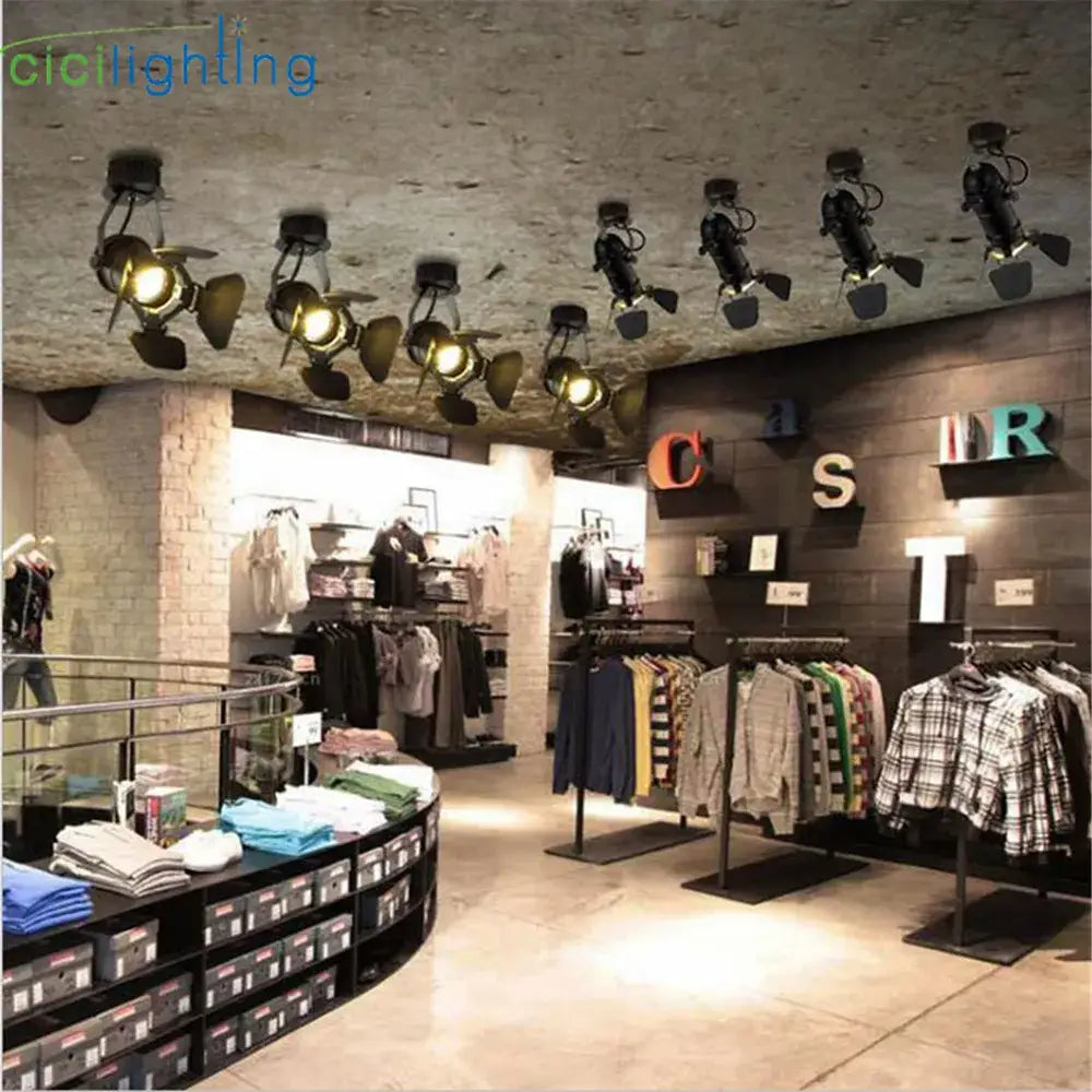 Black decorbites led surface mount spotlights with adjustable heads and warm yellow bulbs for stylish indoor lighting