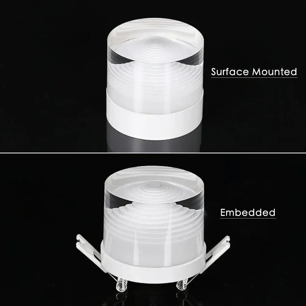 Clear cylindrical led spotlight with white base and mounting brackets in decorbites led surface mounted spot lights series