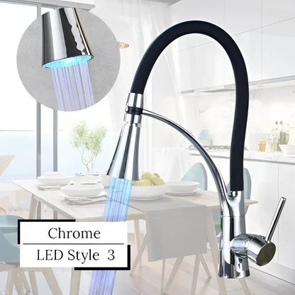 Chrome kitchen faucet with flexible black hose and led-lit spray head decorbites led swivel pull for hot and cold water mixer