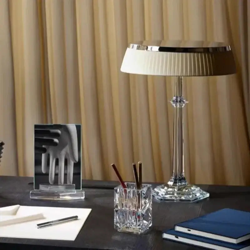 A sleek decorbites led table lamp with a fluted white shade and clear crystal base for modern home decor