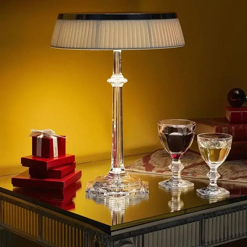 Elegant DecorBites LED table lamp with crystal base, pleated off-white shade, and polished chrome trim for modern decor