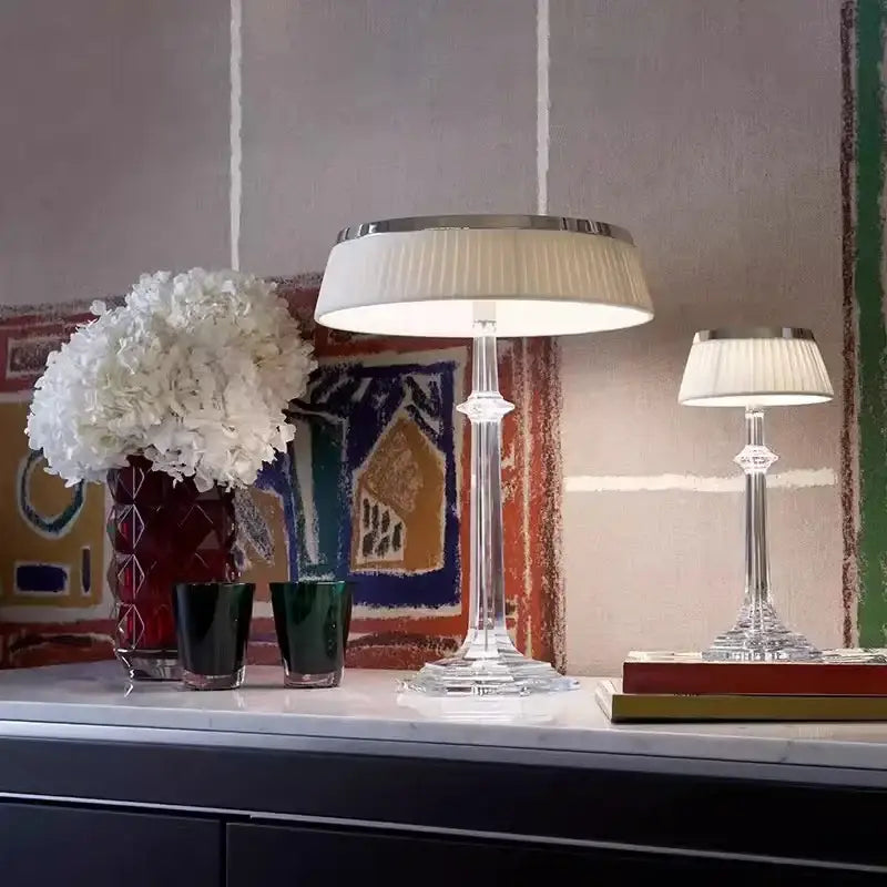 Elegant decorbites led table lamp with crystal base, pleated off-white shade, and polished chrome trim for modern decor