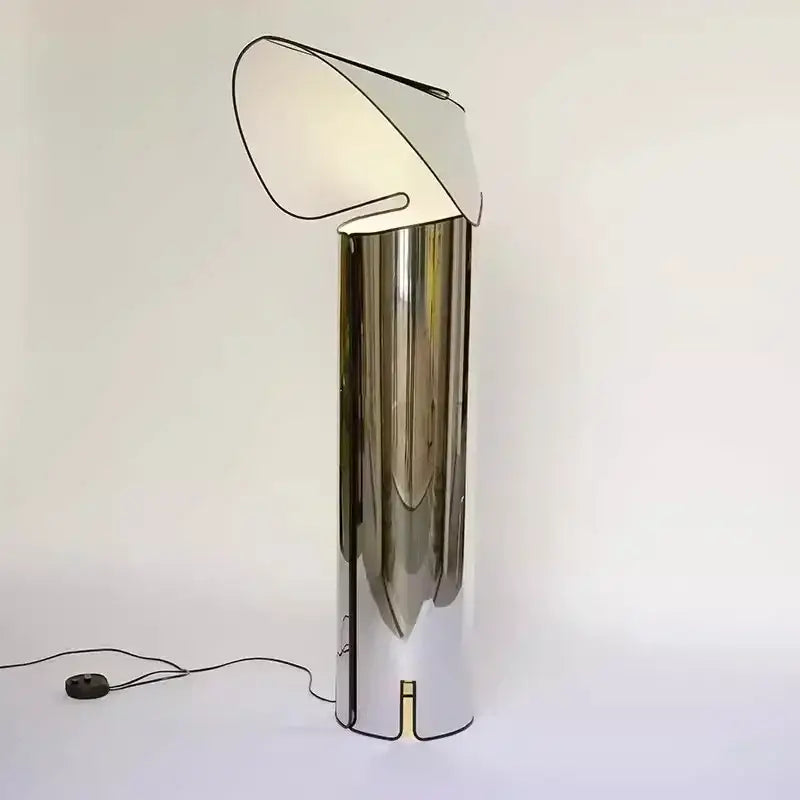 A sleek chrome finished decorbites led floor lamp with a cylindrical base and curved white shade for modern lighting