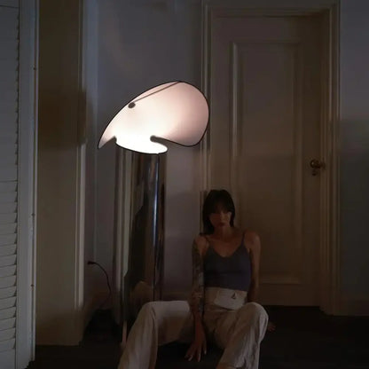 A decorbites led floor lamp with a sculpted white shade and chrome base for modern home and study lighting