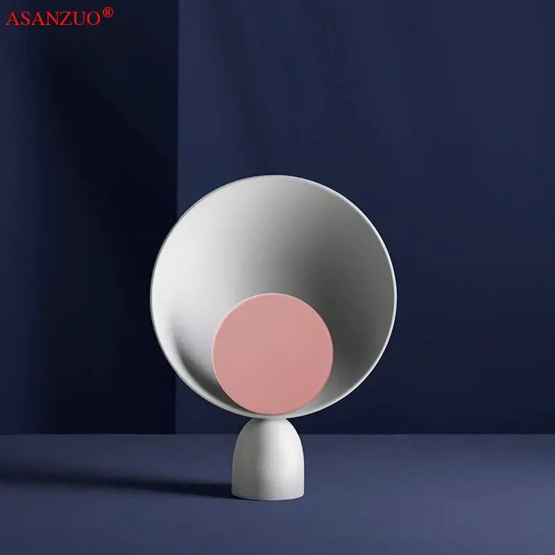 Minimalist white ceramic decorbites led table lamp with soft pink accent for modern living room and study desk lighting