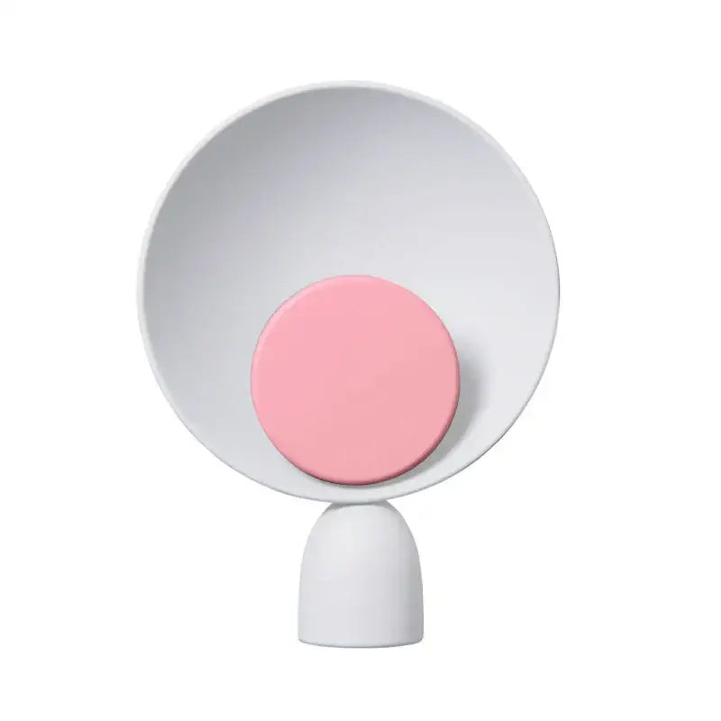 Minimalist white ceramic decorbites led table lamp with soft pink circular accent for living room and study desk lighting