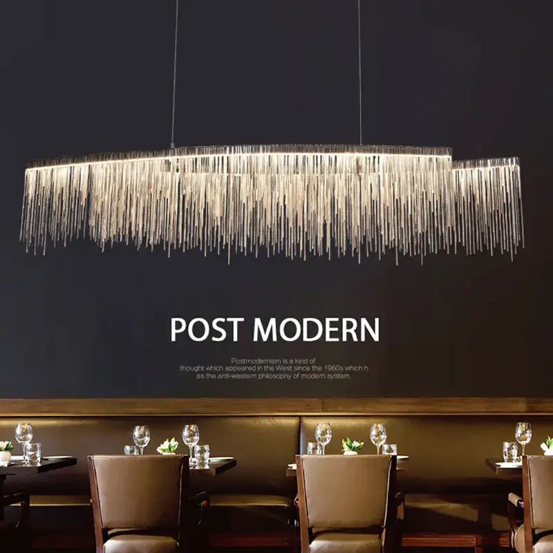 A decorbites led tassel chandelier pendant light with cascading silver metallic strands for living room villa hall