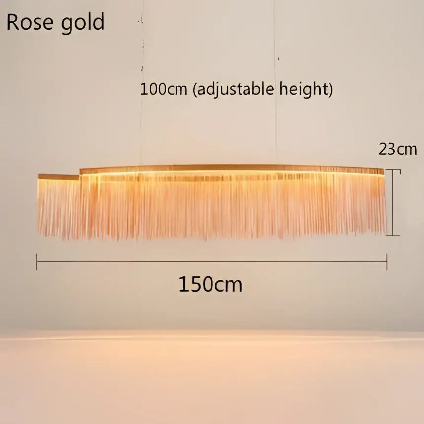 Rose gold decorbites led tassel chandelier with cascading fringe in a modern rectangular waterfall pendant light design
