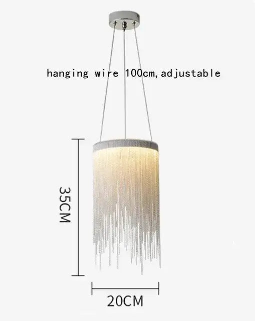 A modern decorbites led tassel chandelier with chrome mount and cascading silver crystal beads emitting warm glow