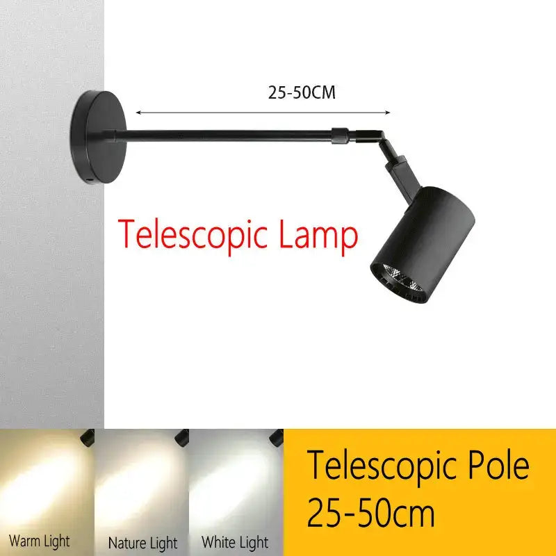 Black telescopic wall lamp with adjustable pole and cylindrical head made of aluminium for painting gallery lighting